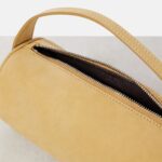 The Row Round ’90s Compact Suede Tote Bag – Mustard Ans