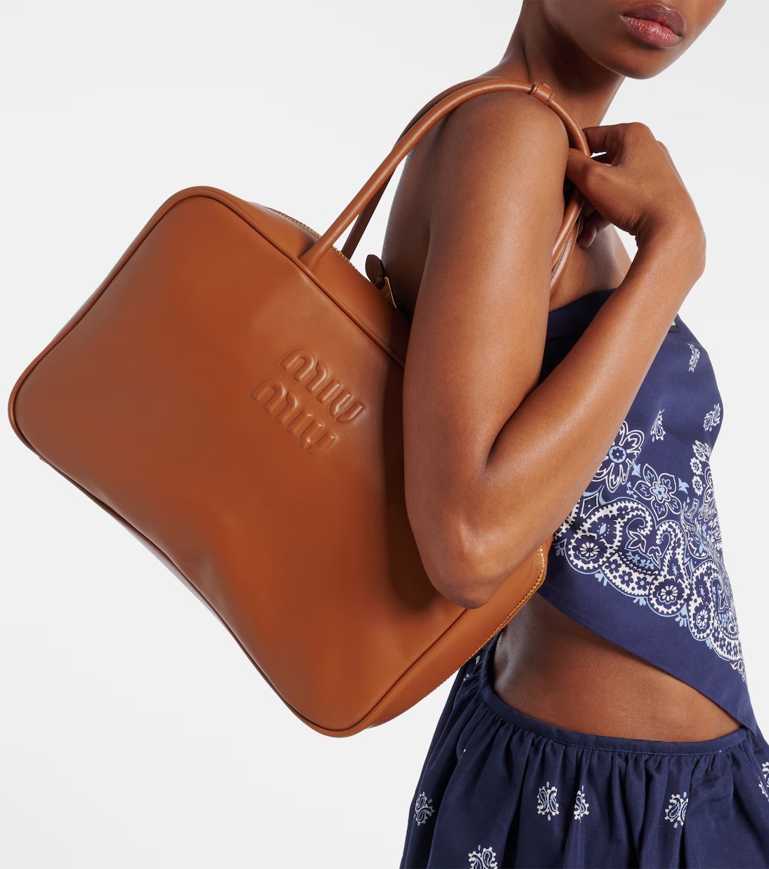 Miu Miu Beau leather tote bag in cognac brown calf leather with gold-tone hardware Miu Miu Beau leather tote bag in cognac brown calf leather with gold-tone hardware