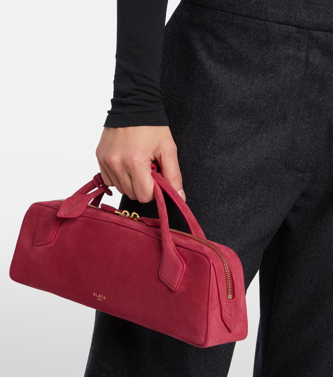 Alaïa Le Teckel Small Suede Clutch Bag in Framboise Pink Alaïa Le Teckel Small Suede Clutch Bag in Framboise Pink