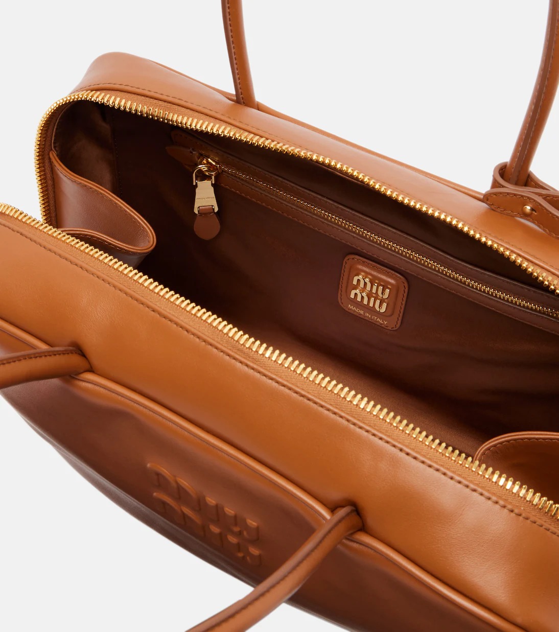Miu Miu Beau leather tote bag in cognac brown calf leather with gold-tone hardware Miu Miu Beau leather tote bag in cognac brown calf leather with gold-tone hardware