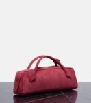 Alaïa Le Teckel Small Suede Clutch Bag in Framboise Pink