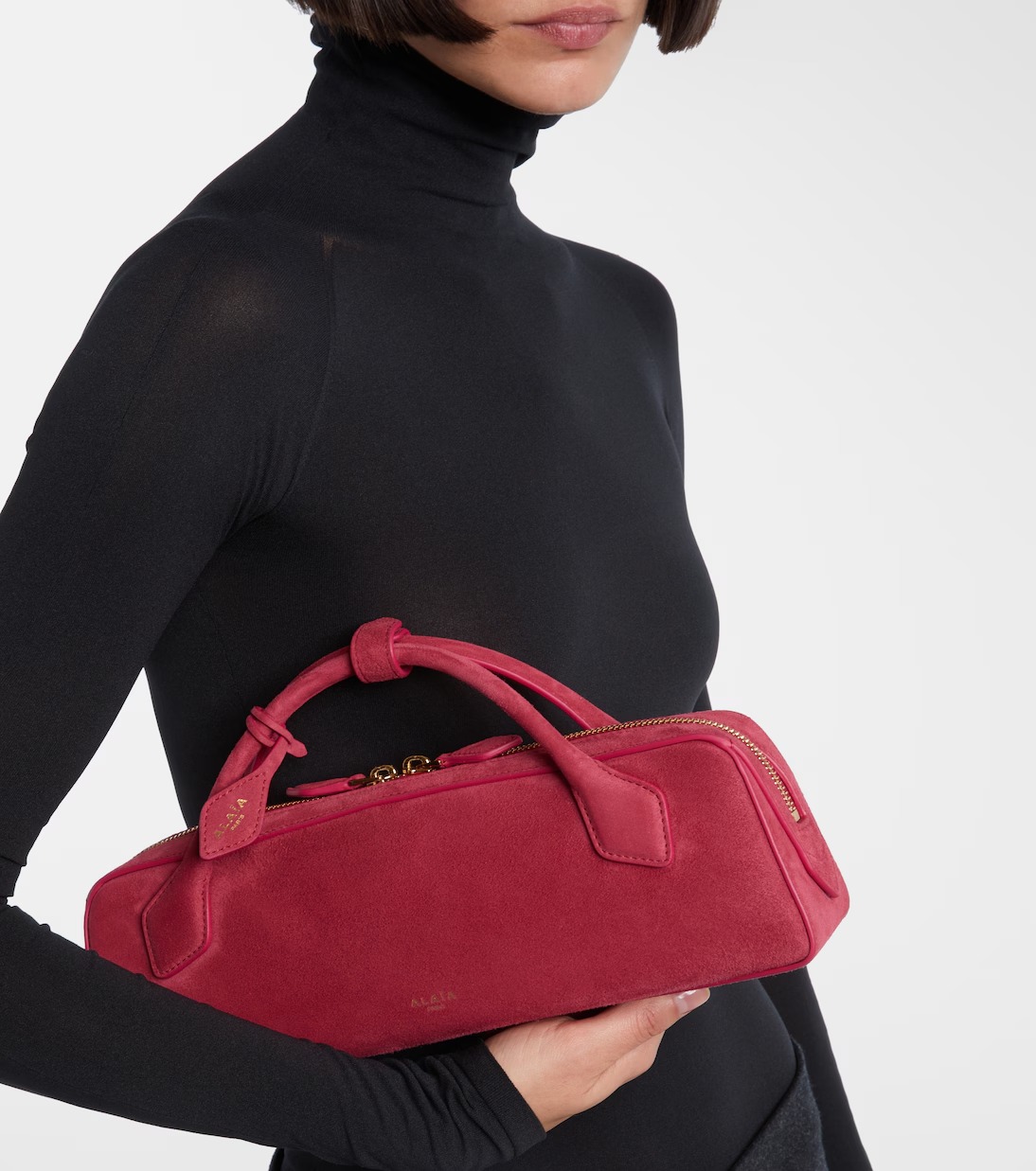 Alaïa Le Teckel Small Suede Clutch Bag in Framboise Pink Alaïa Le Teckel Small Suede Clutch Bag in Framboise Pink