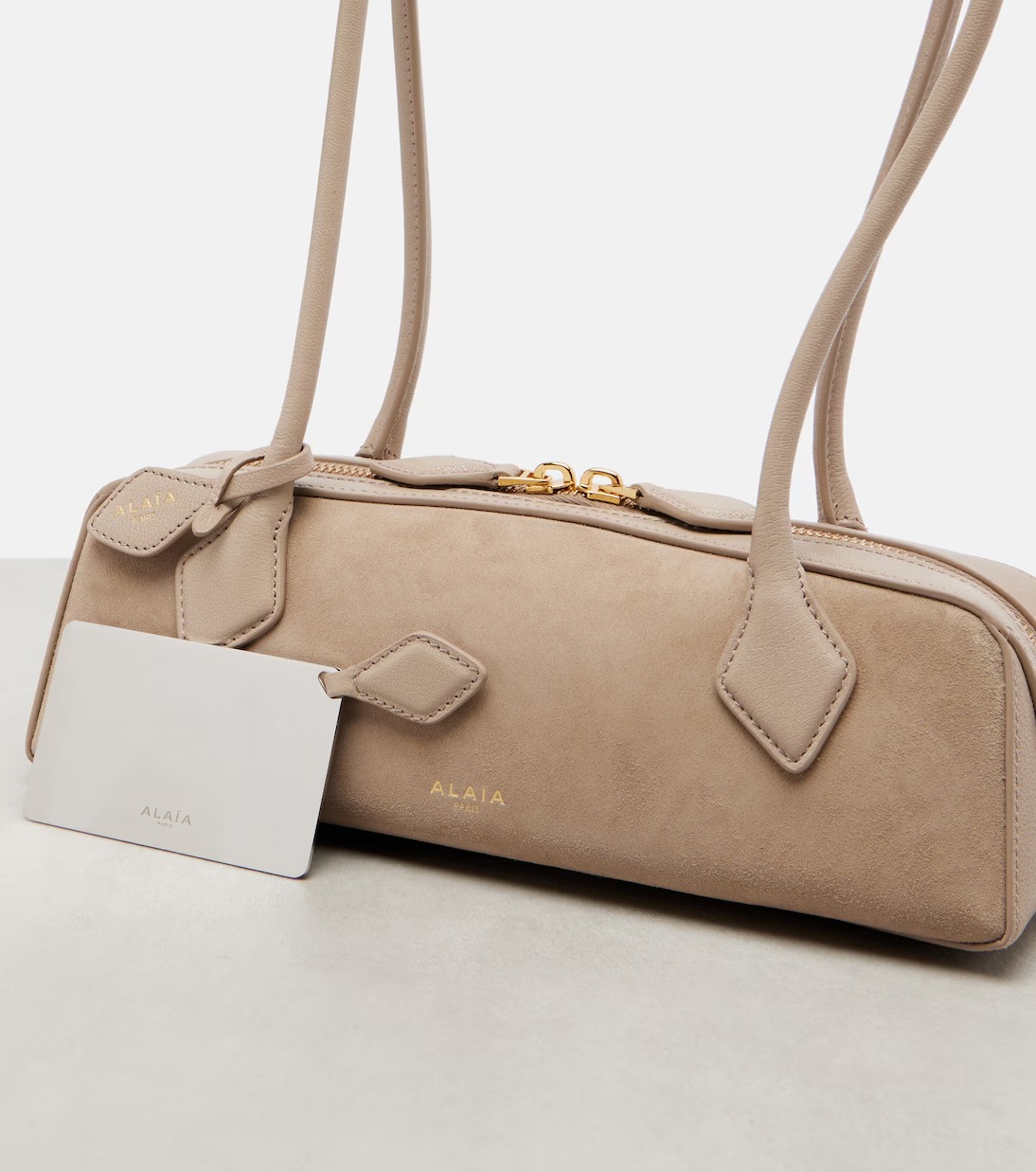 Alaïa Le Teckel Small Suede Shoulder Bag Beige | Crown Clutch Alaïa Le Teckel Small Suede Shoulder Bag Beige | Crown Clutch